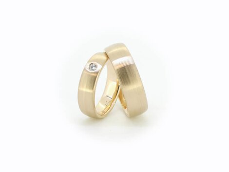 Klasikiniai vestuviniai žiedai su briliantu dk3101